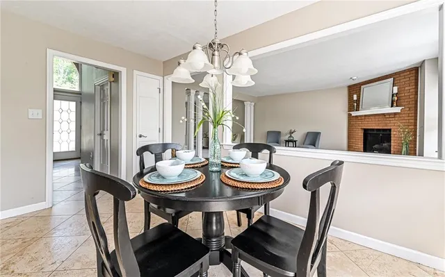 a kitchen with a sink window and cabinets
