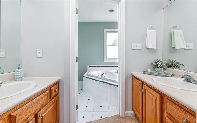 a bathroom with a bathtub and a toilet