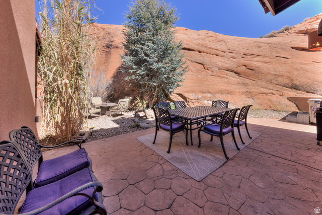 3461 Westwater Road, Unit 6 Moab, UT 84532 - Photo 27 of 33 View of patio featuring outdoor dining area and a mountain view