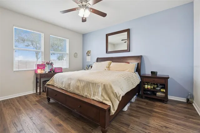 a bed room with a bed and a window