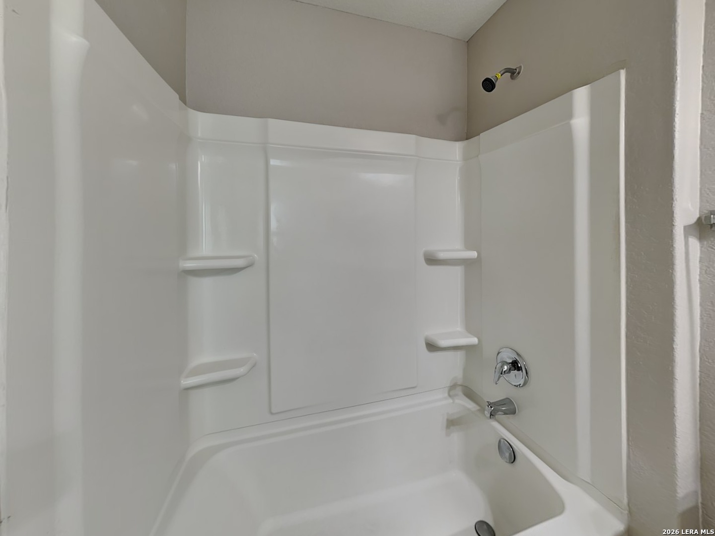 5118 Everett Loop Converse, TX 78109 - Photo 8 of 16 a bathroom with a bathtub and shower
