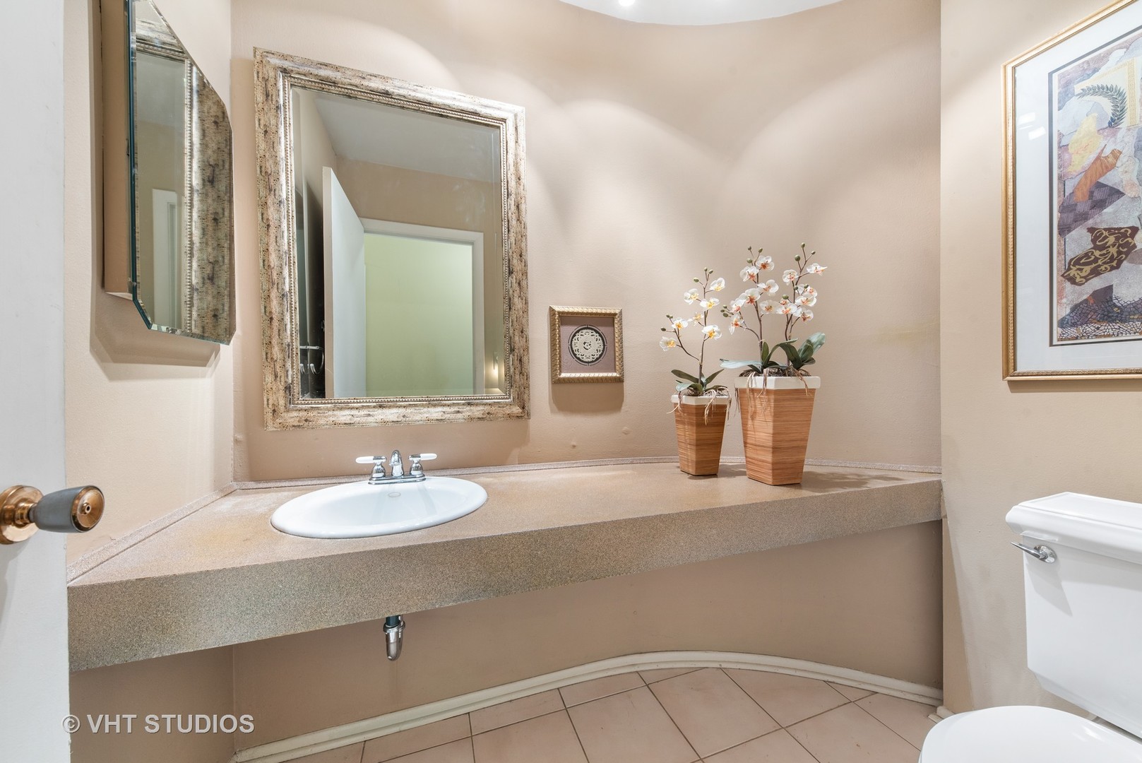 309 Bennett Lane Des Plaines, IL 60016 - Photo 14 of 18 a bathroom with a granite countertop sink a toilet and mirror