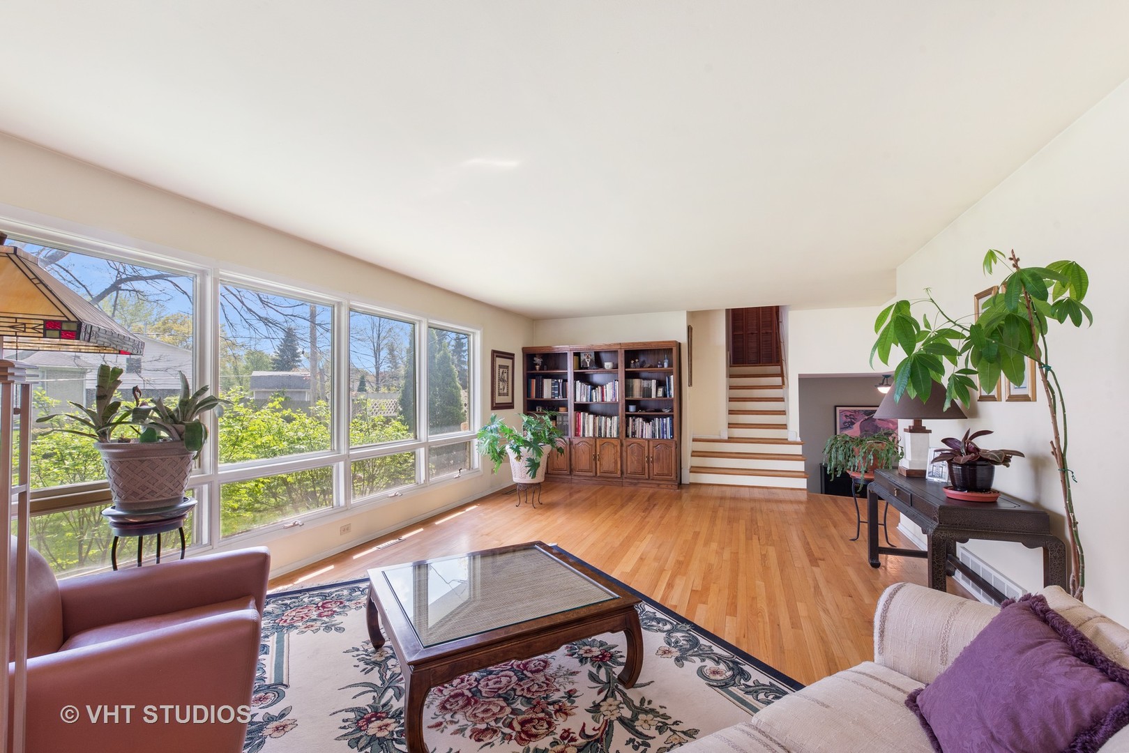 309 Bennett Lane Des Plaines, IL 60016 - Photo 4 of 18 a living room with furniture and a large window
