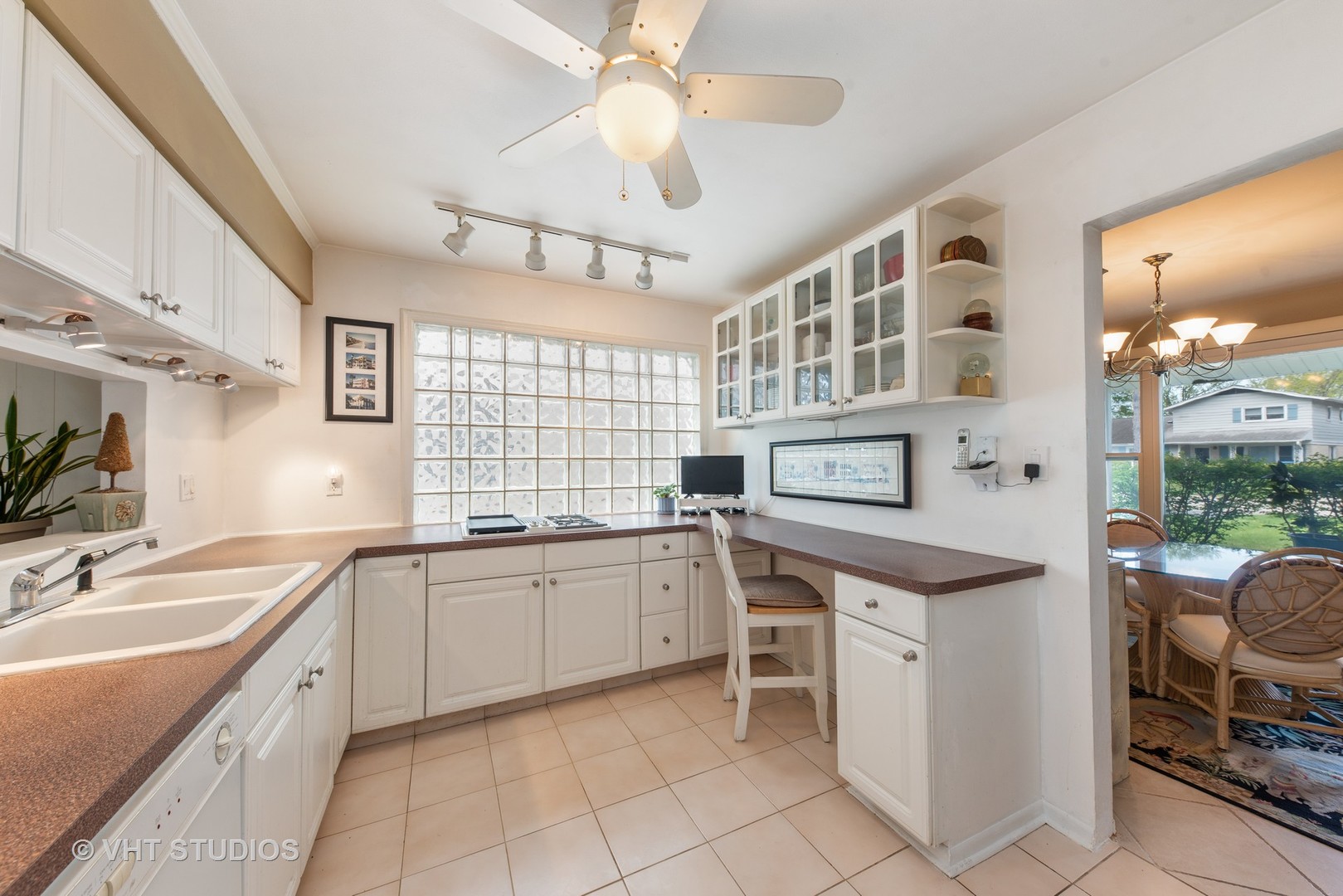 309 Bennett Lane Des Plaines, IL 60016 - Photo 5 of 18 a kitchen with stainless steel appliances a sink and cabinets
