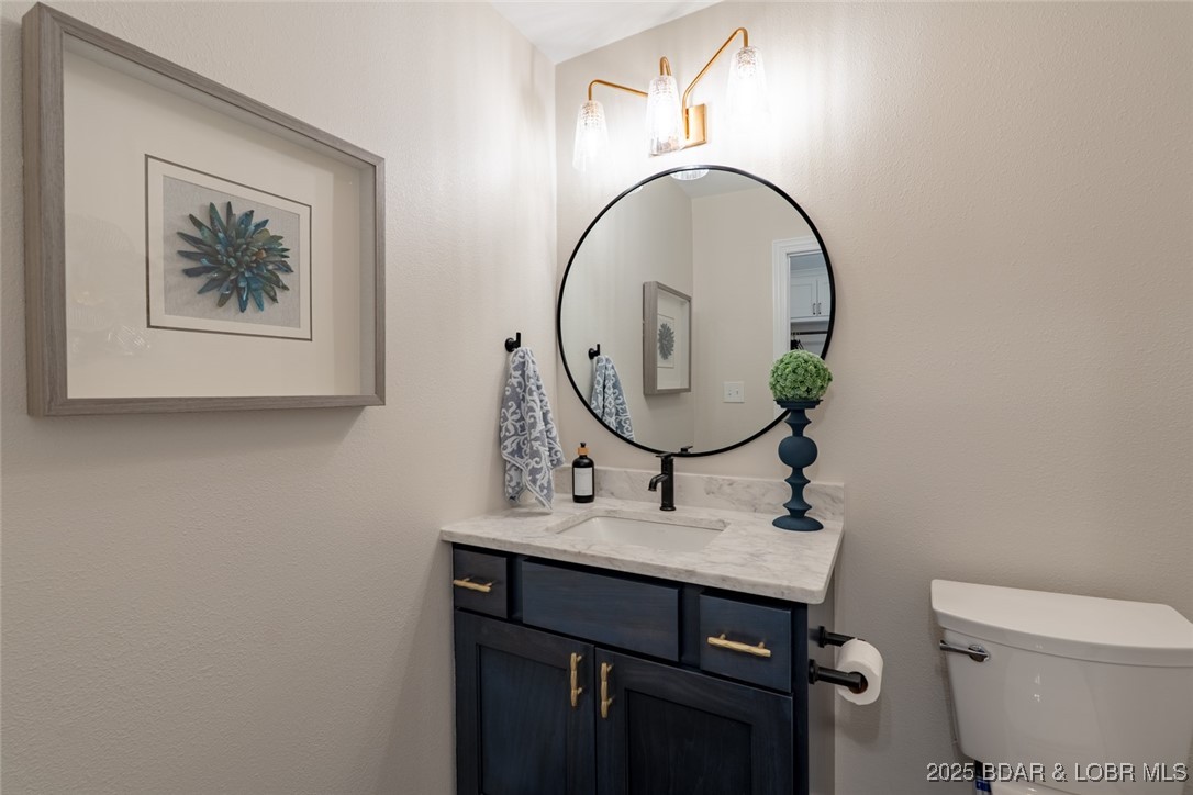 999 Imperial Point Drive Four Seasons, MO 65049 - Photo 18 of 74 Half bath off kitchen