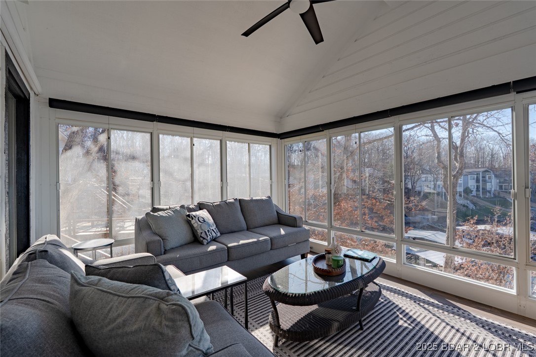 999 Imperial Point Drive Four Seasons, MO 65049 - Photo 22 of 74 Climate controlled sunporch off dining area has vi