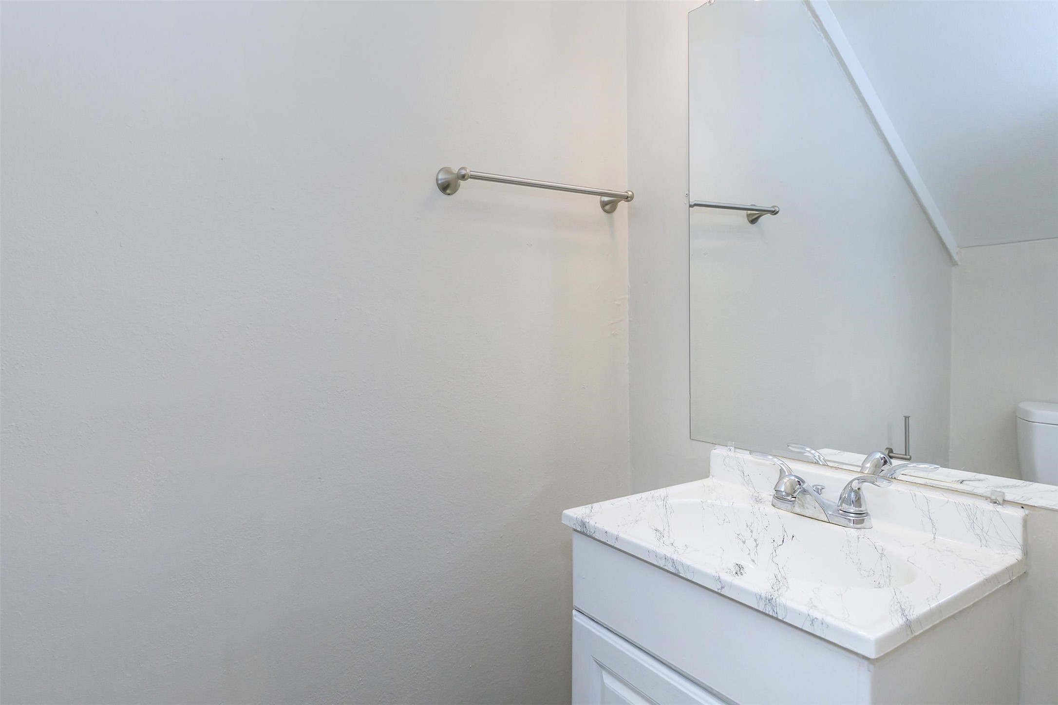 8271 Stone Street, Unit 7140 Houston, TX 77061 - Photo 13 of 28 a bathroom with a sink and vanity