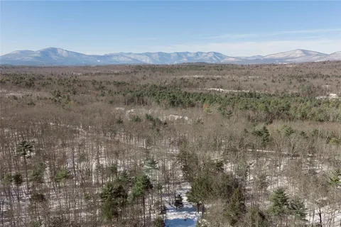 a view of mountain with lake view