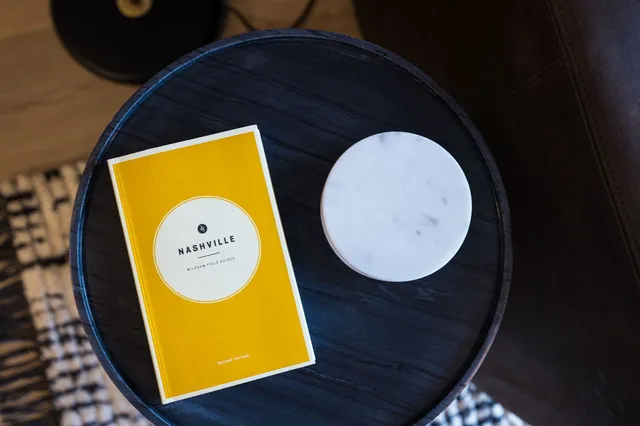 a vase of flowers sitting on a table