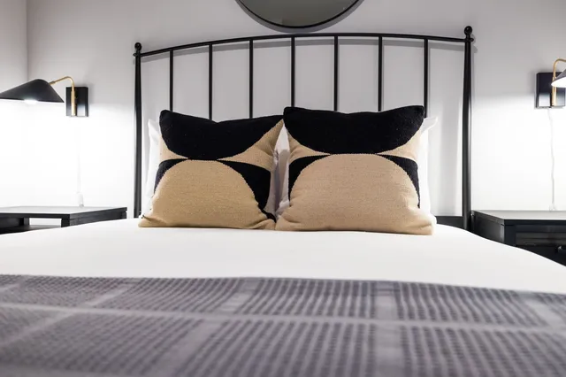 a view of a livingroom with furniture and a window