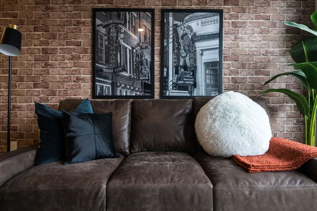 a bed room with a bed and with chair