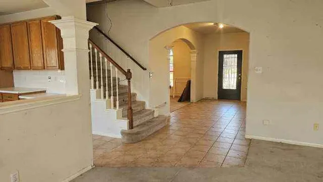 a living room with a fireplace
