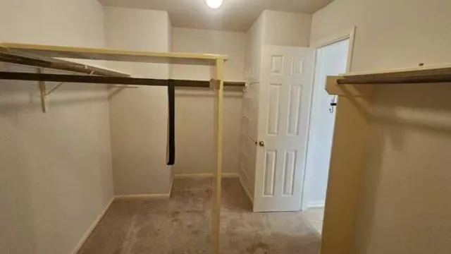 a bathroom with a tub a sink and a shower