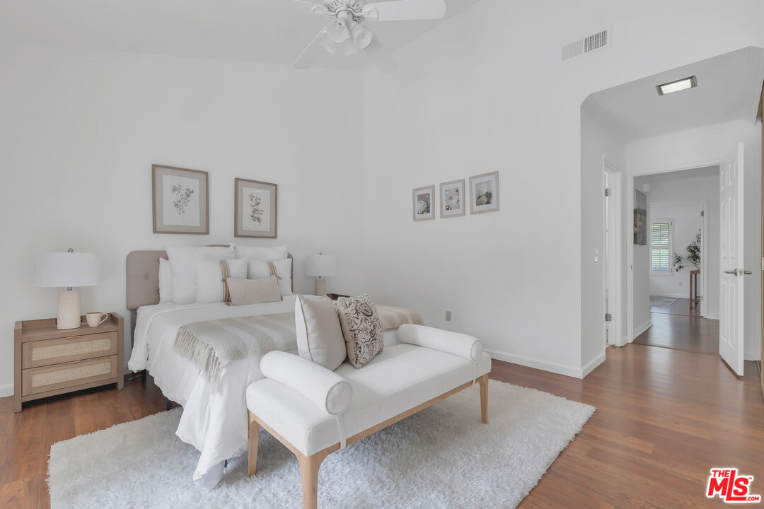 11700 Doral Avenue Porter Ranch, CA 91326 - Photo 38 of 65 a living room with furniture and a wooden floor