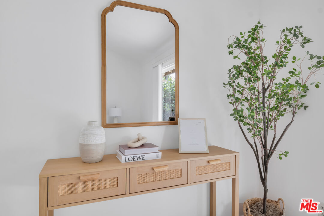 11700 Doral Avenue Porter Ranch, CA 91326 - Photo 40 of 65 a bathroom with a sink and a mirror
