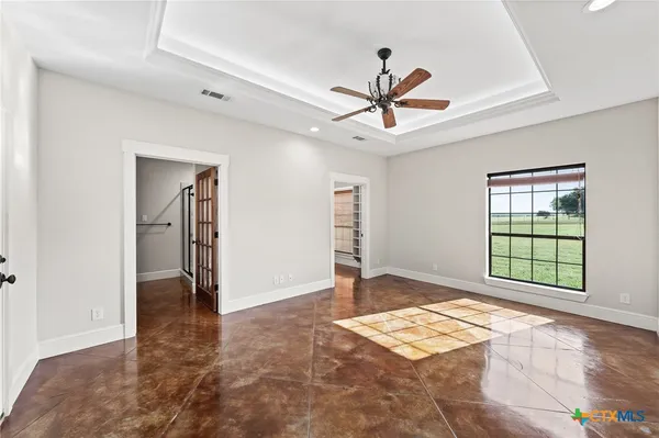 a view of an empty room and window