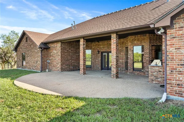 a view of a house with patio