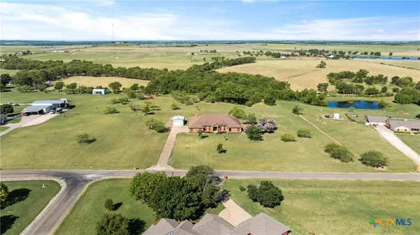 a view of a city with an ocean view