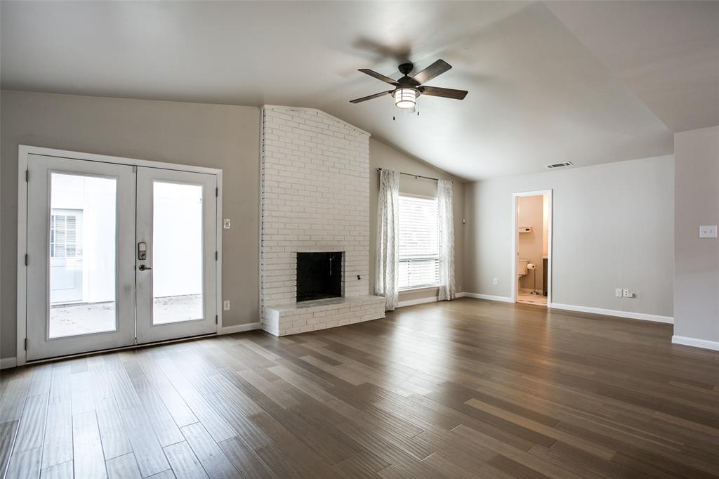 2012 Custer Parkway Richardson, TX 75080 - Photo 3 of 12 a view of an empty room with wooden floor and a window
