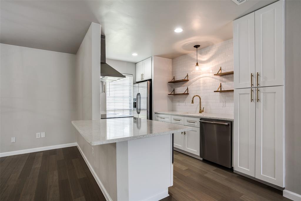 2012 Custer Parkway Richardson, TX 75080 - Photo 6 of 12 a kitchen with stainless steel appliances granite countertop a refrigerator a sink and a stove