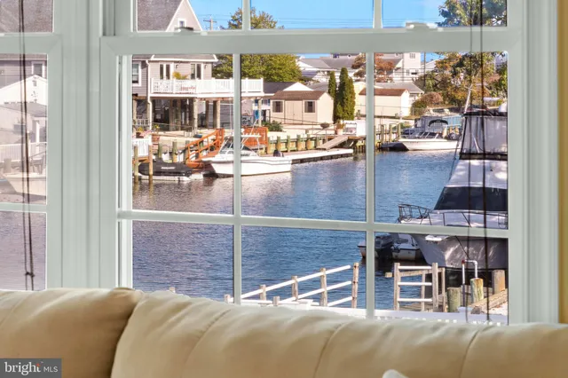 a view of a balcony with furniture