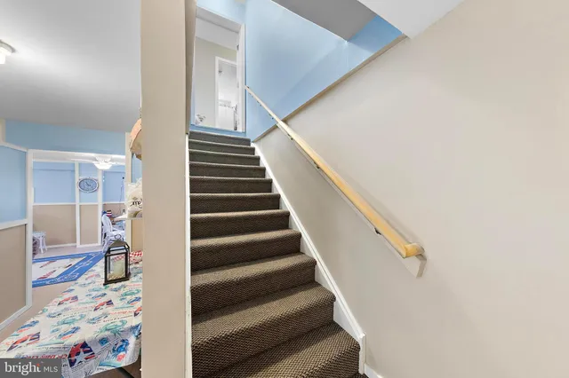 a view of water heater and stairs