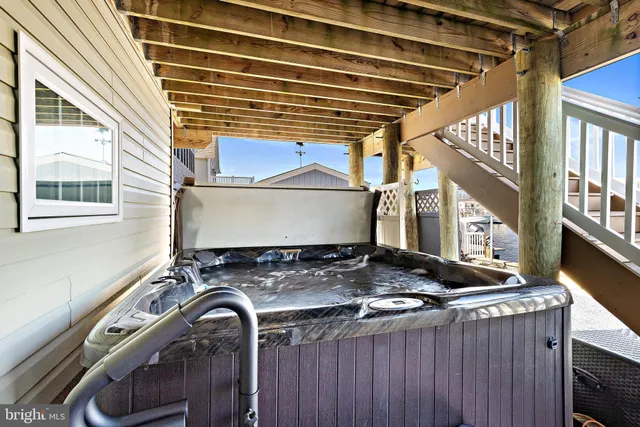 a view of a lake with outdoor seating