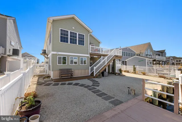 a view of a lake with tall buildings