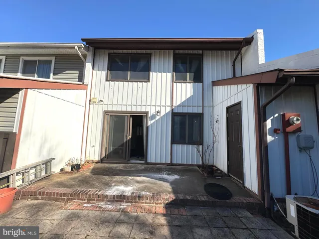 a front view of a house with a porch