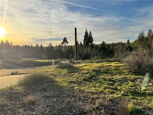 a view of a town with mountains