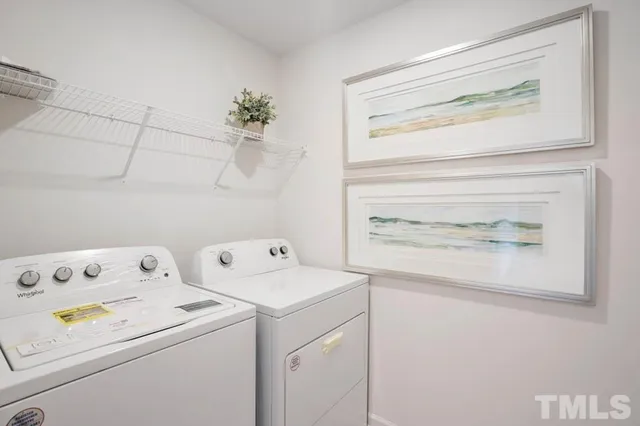 a living room with furniture and window