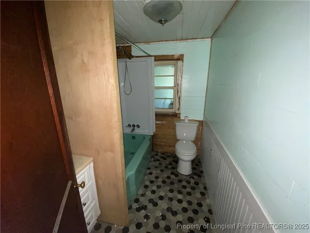 a bathroom with a sink and a toilet
