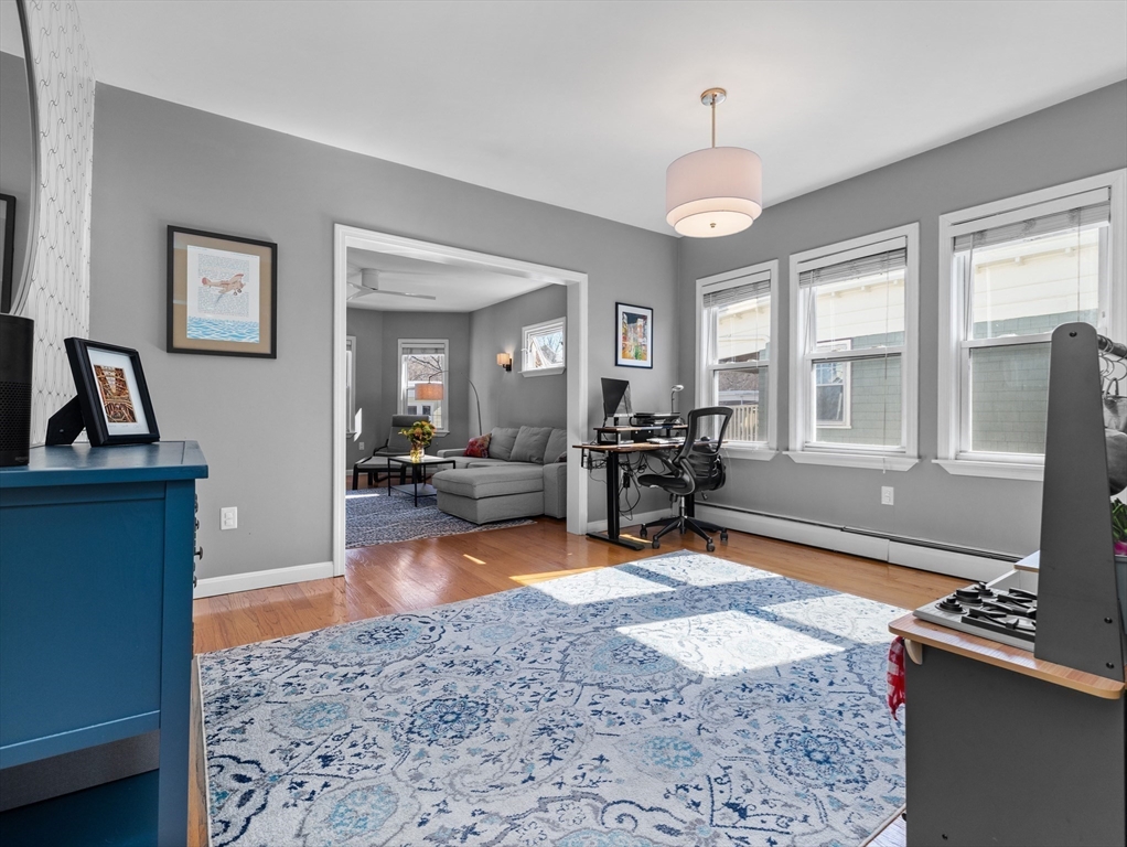 91-93 Rossmore Road, Unit 3 Boston, MA 02130 - Photo 6 of 25 a living room with furniture rug and window