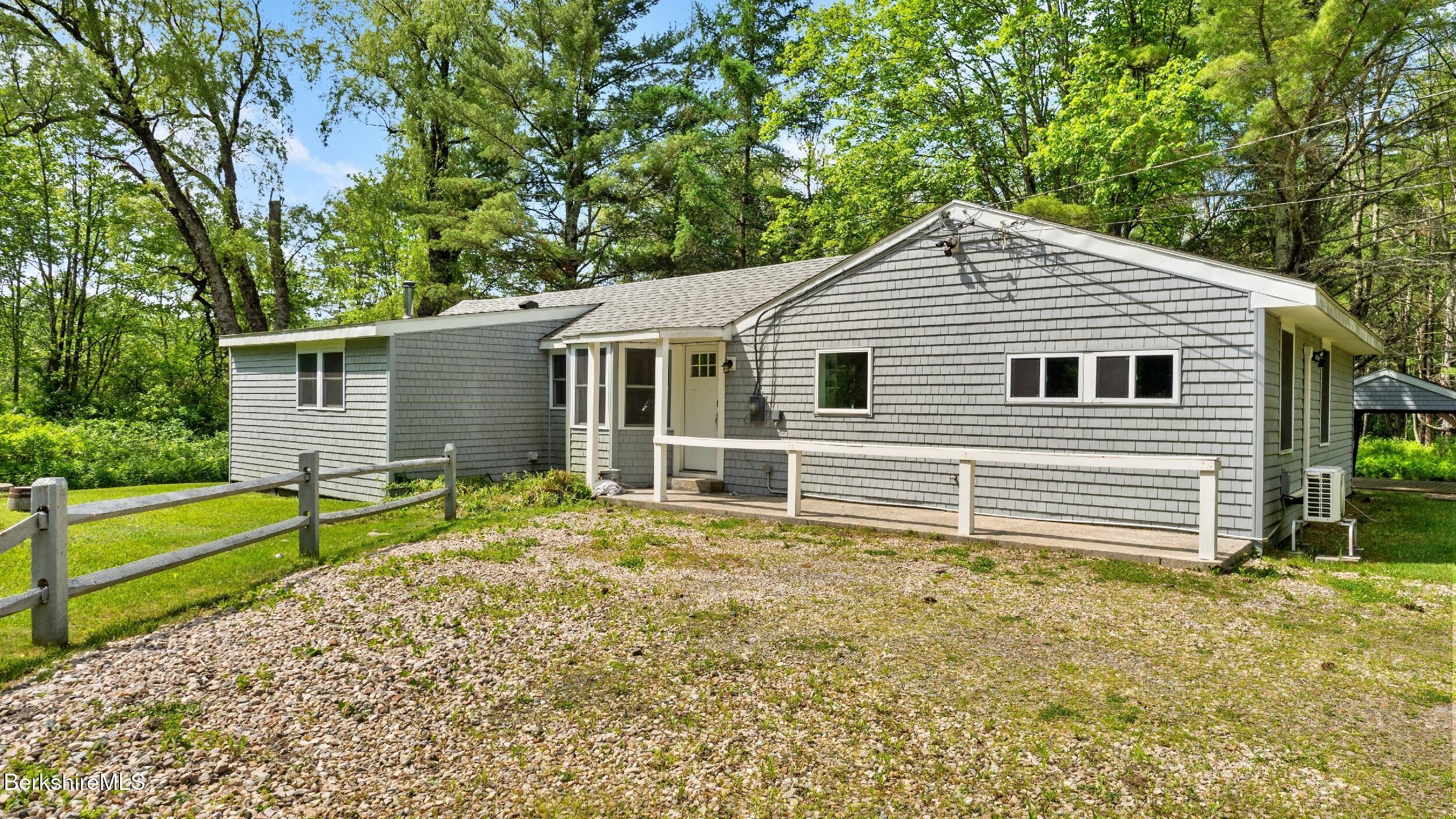 418 Monterey Road Great Barrington, MA 01230 - Photo 28 of 28 a front view of a house with a yard
