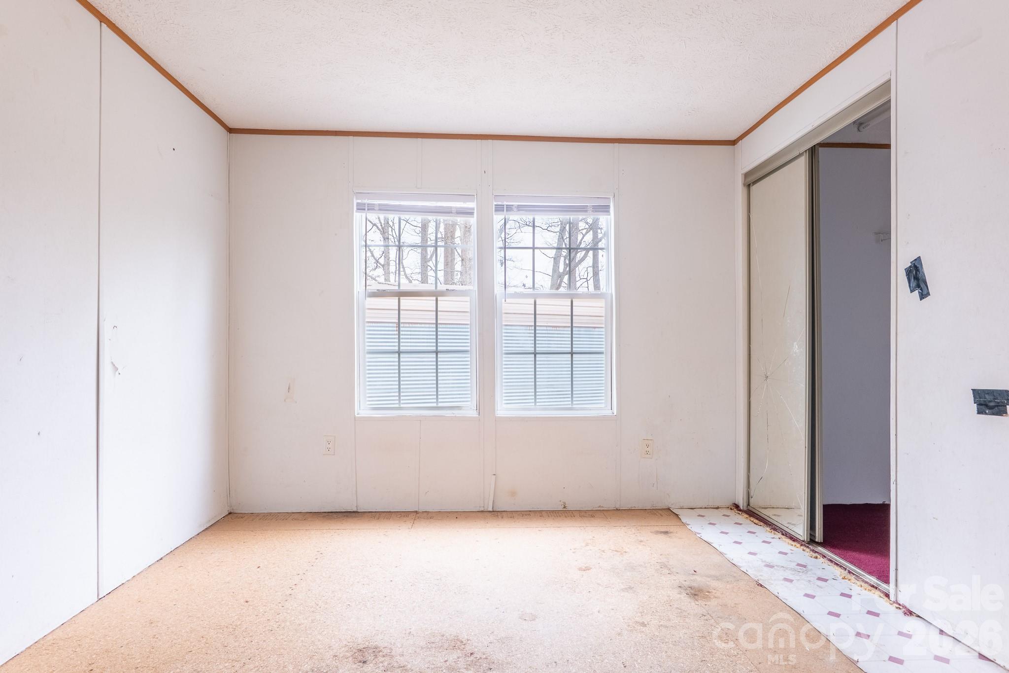 8636 County Line Road Hickory, NC 28602 - Photo 14 of 18 an empty room with windows