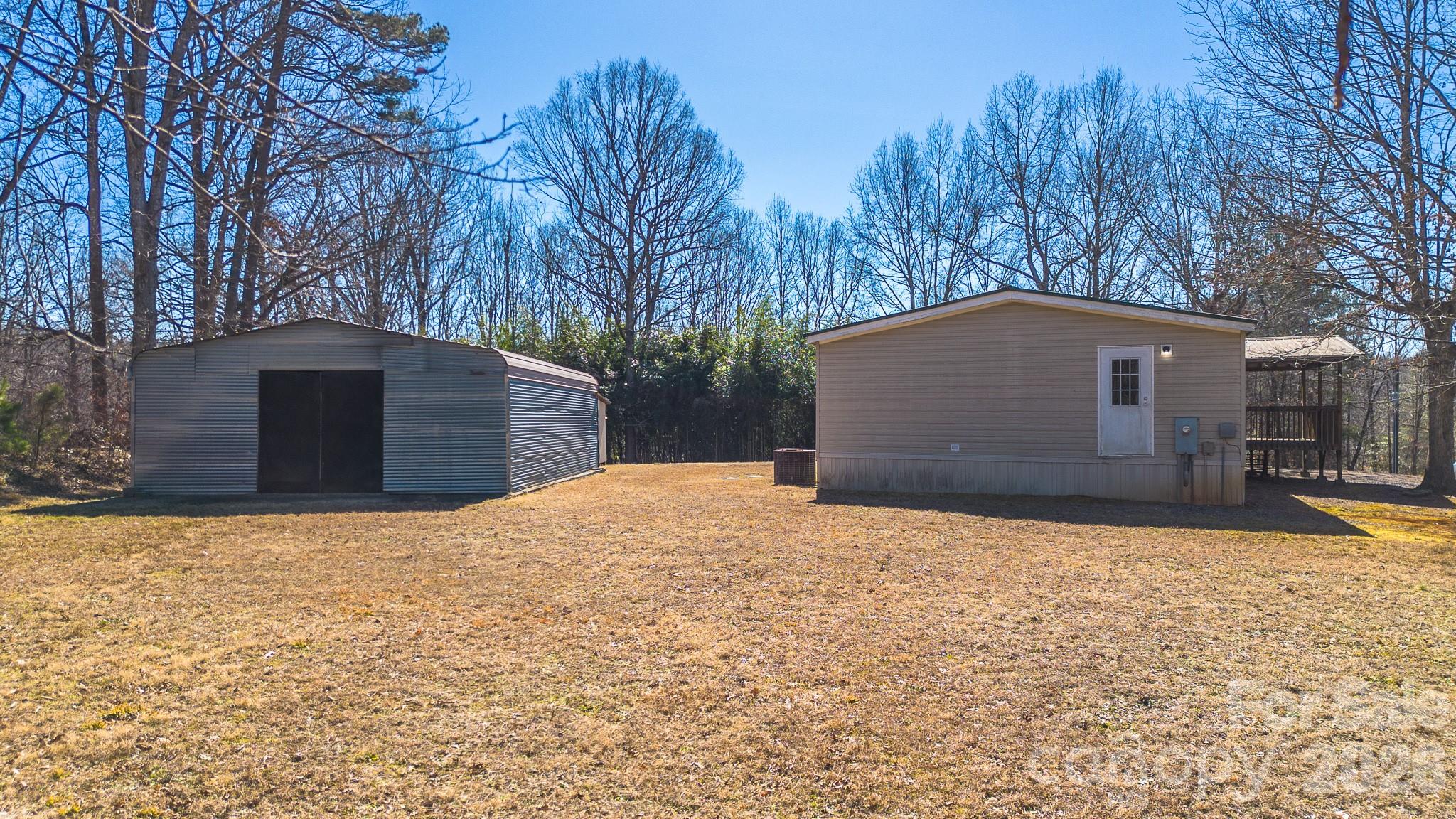 8636 County Line Road Hickory, NC 28602 - Photo 4 of 18 a house with trees in front of it