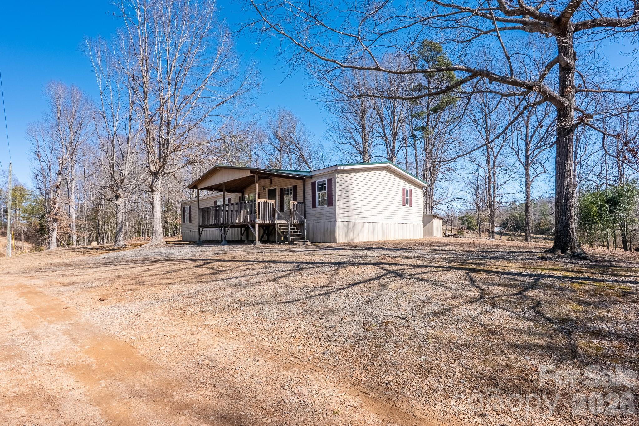 8636 County Line Road Hickory, NC 28602 - Photo 5 of 18 a house with trees in front of it