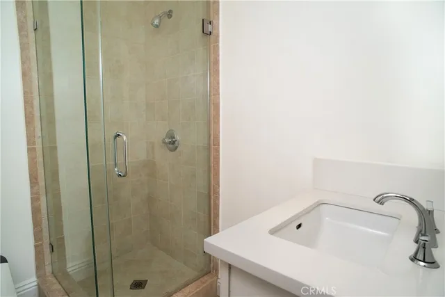 a bathroom with a tub and shower