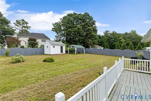 a view of a swimming pool with a lounge chairs