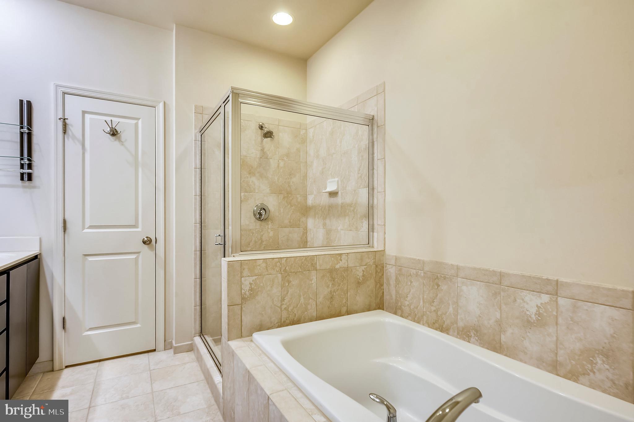 9852 Garden Ranges Laurel, MD 20723 - Photo 16 of 26 Master Bath with Soaking Tub