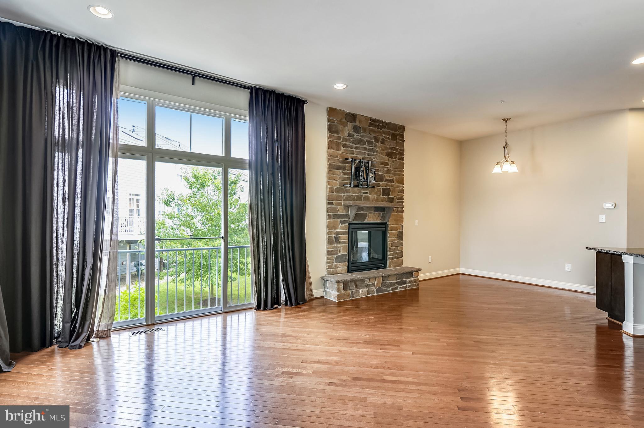 9852 Garden Ranges Laurel, MD 20723 - Photo 3 of 26 Family Room/Dining Room