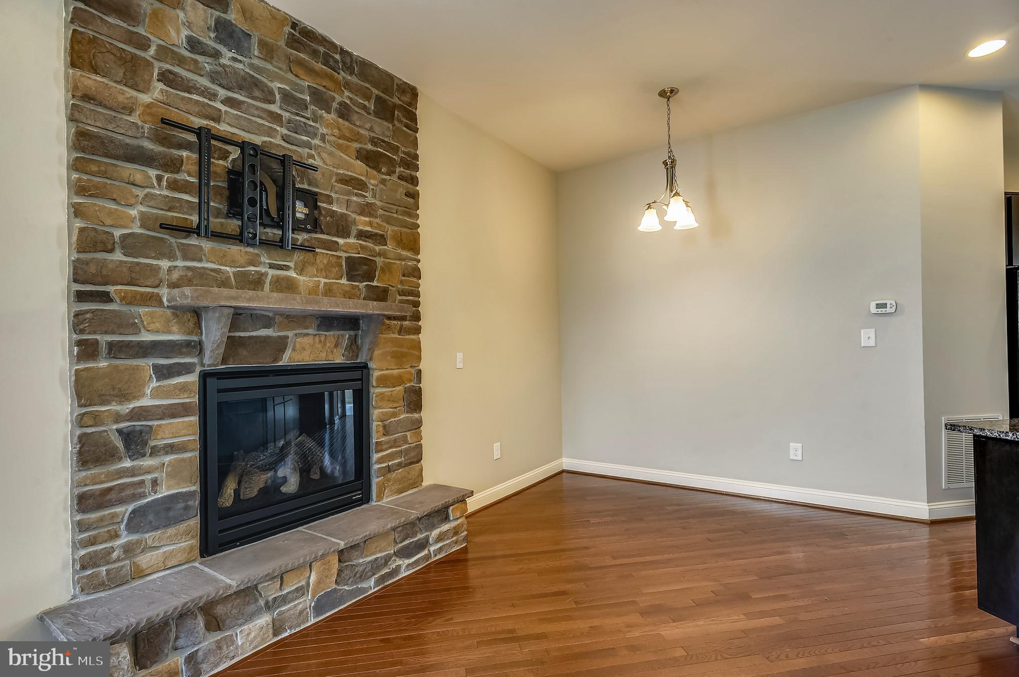 9852 Garden Ranges Laurel, MD 20723 - Photo 5 of 26 Dining Room with Gas Fireplace