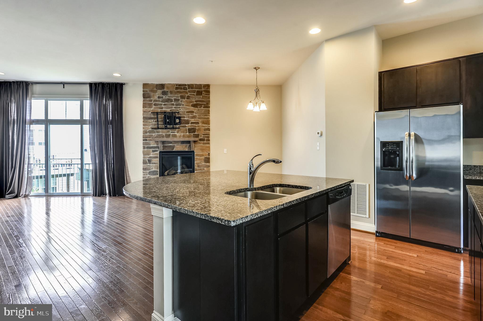 9852 Garden Ranges Laurel, MD 20723 - Photo 7 of 26 Kitchen with Granite Counters, Hardwood Floors
