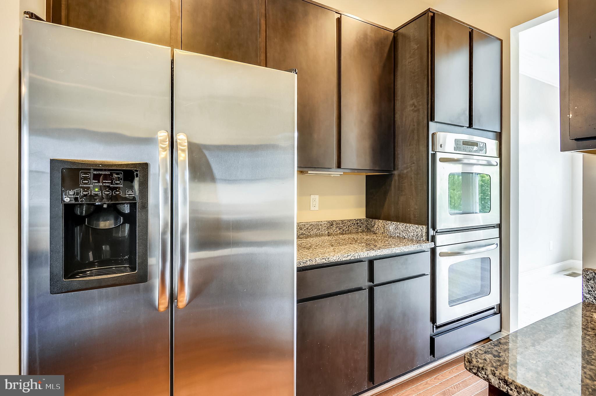 9852 Garden Ranges Laurel, MD 20723 - Photo 8 of 26 Kitchen with Cooktop & Double Ovens