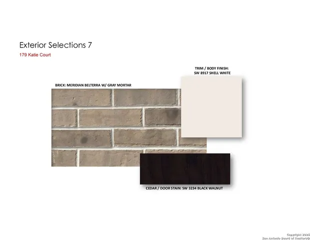 a living room with a rug and white walls