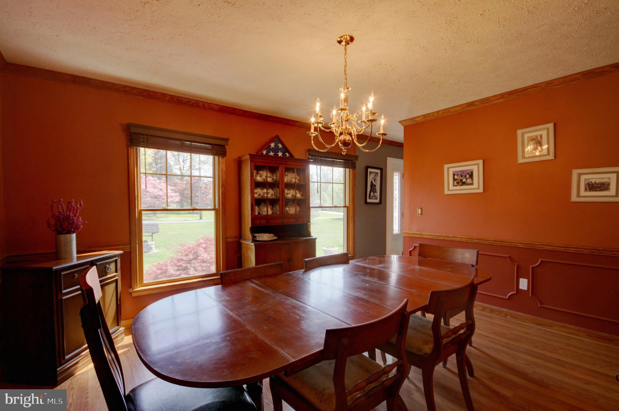 215 Hoffecker Road Phoenixville, PA 19460 - Photo 11 of 49 a view of a dining room with furniture window and wooden floor
