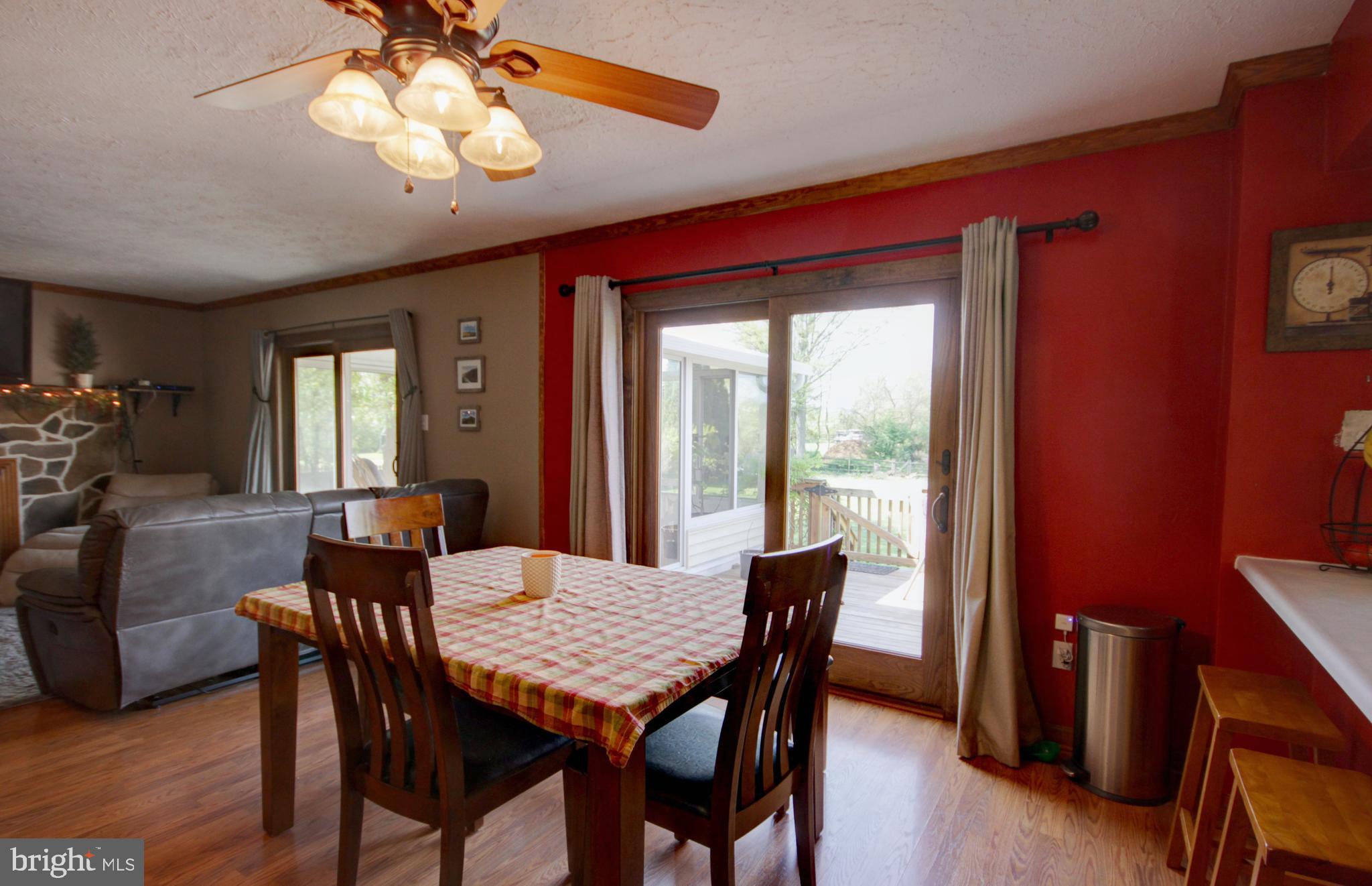 215 Hoffecker Road Phoenixville, PA 19460 - Photo 16 of 49 a view of a dining room with furniture window and wooden floor