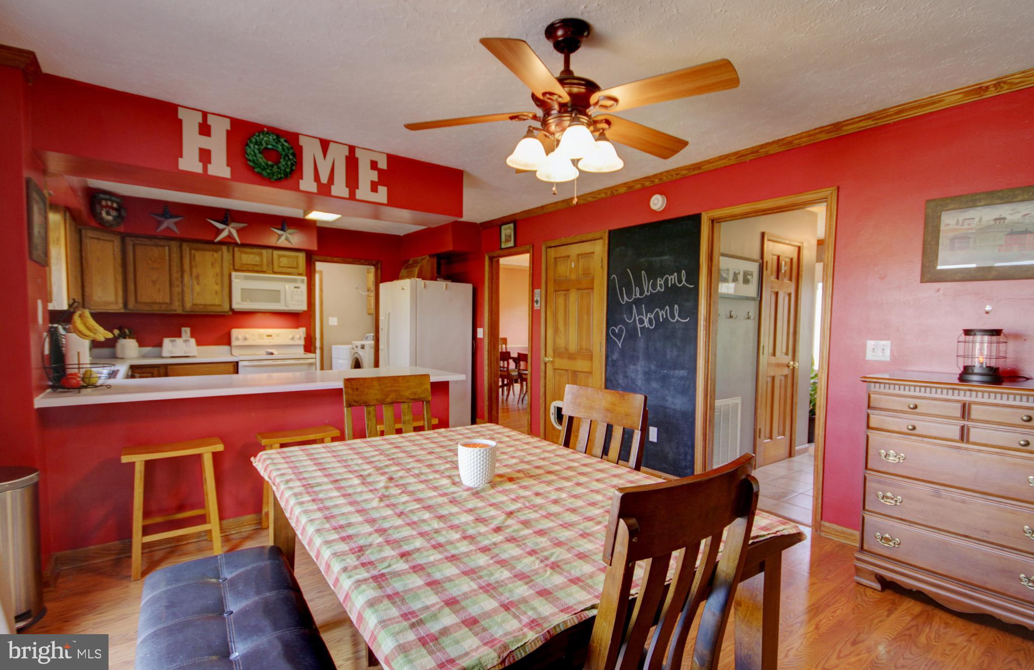 215 Hoffecker Road Phoenixville, PA 19460 - Photo 17 of 49 a dining room with a table and chairs