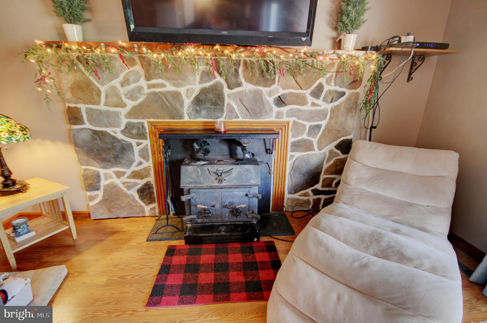 215 Hoffecker Road Phoenixville, PA 19460 - Photo 21 of 49 a room with furniture and a fireplace