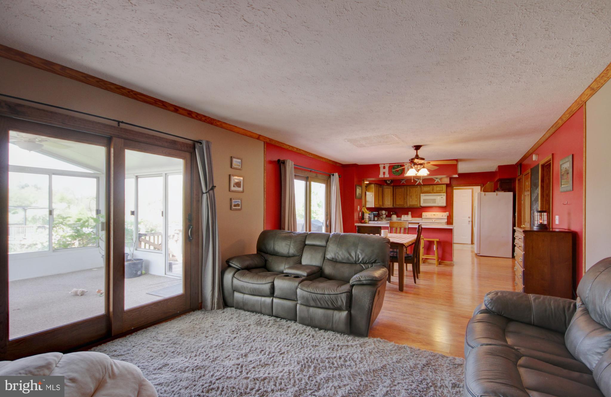 215 Hoffecker Road Phoenixville, PA 19460 - Photo 22 of 49 a living room with furniture and a large window